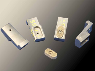 Spannfinger mit eingesetzten Spannmessern aus hochfestem Stahl oder Hartmetall Spannfinger mit eingesetzten Spannmessern aus hochfestem Stahl oder Hartmetall
